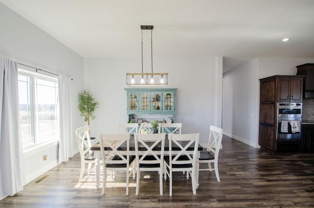 dining space featuring recessed lighting, visible vents, baseboards, and wood finished floors