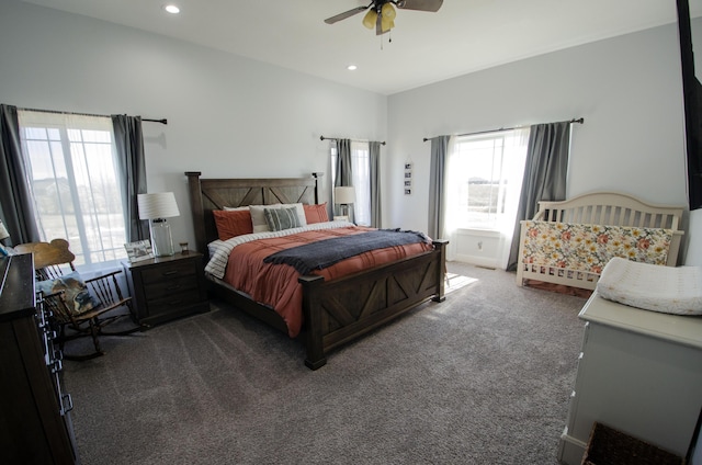 bedroom with dark carpet, a ceiling fan, and recessed lighting