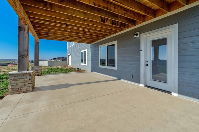 view of patio with fence