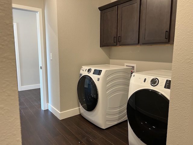 laundry room with baseboards, dark wood-type flooring, and independent washer and dryer