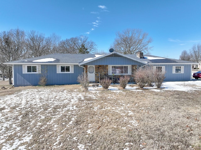 ranch-style house with a chimney