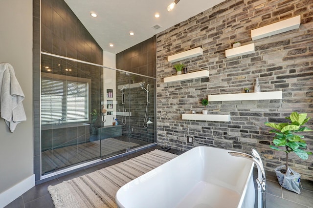 full bath with recessed lighting, a soaking tub, a stall shower, and tile patterned flooring