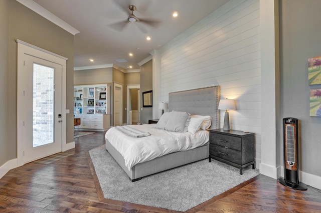 bedroom featuring recessed lighting, dark wood-style floors, baseboards, and ornamental molding