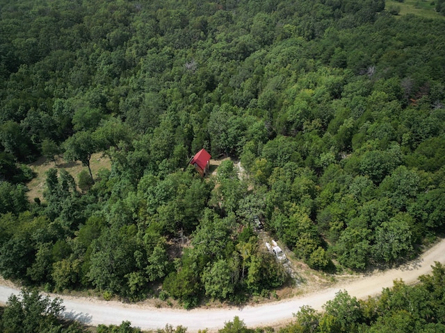 bird's eye view featuring a view of trees