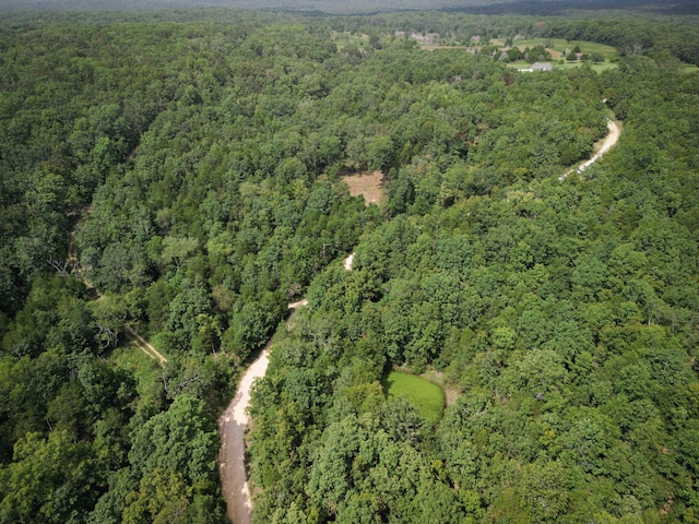 aerial view featuring a view of trees