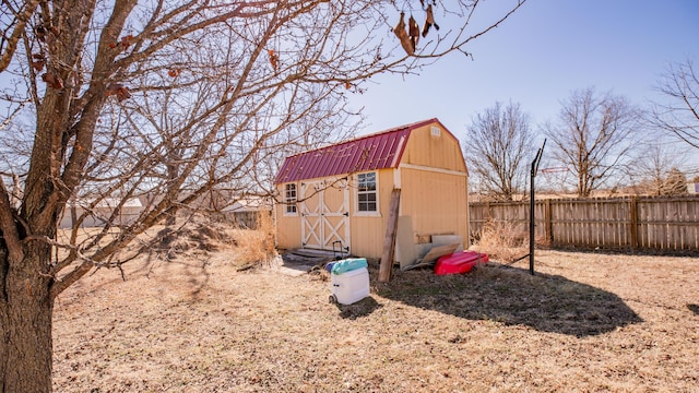 view of shed with fence