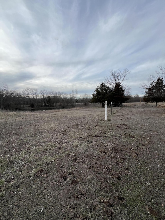 view of yard with a rural view