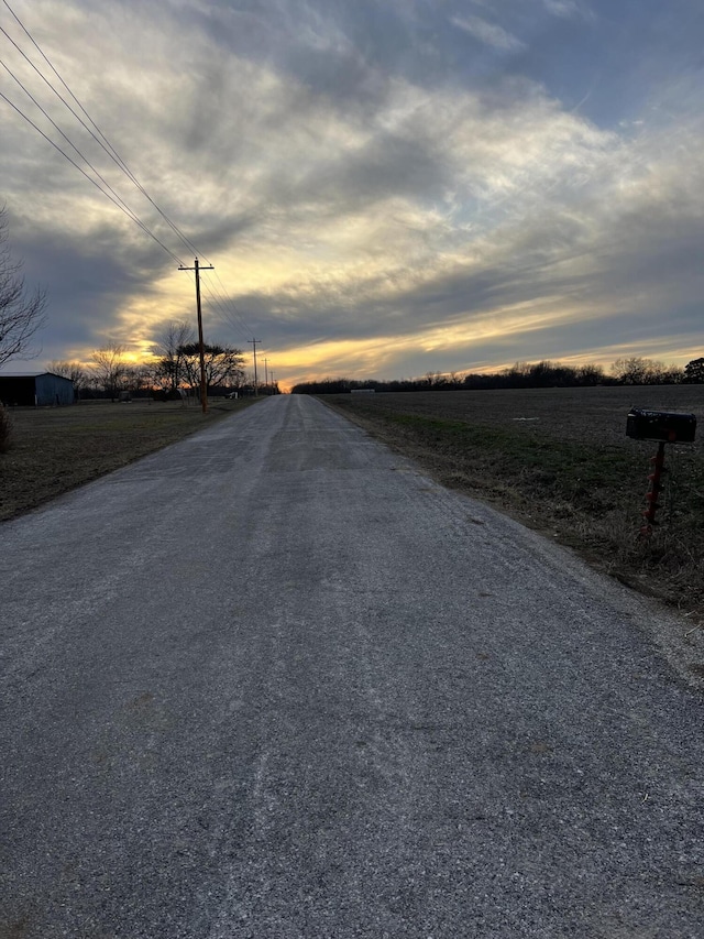 view of road with a rural view