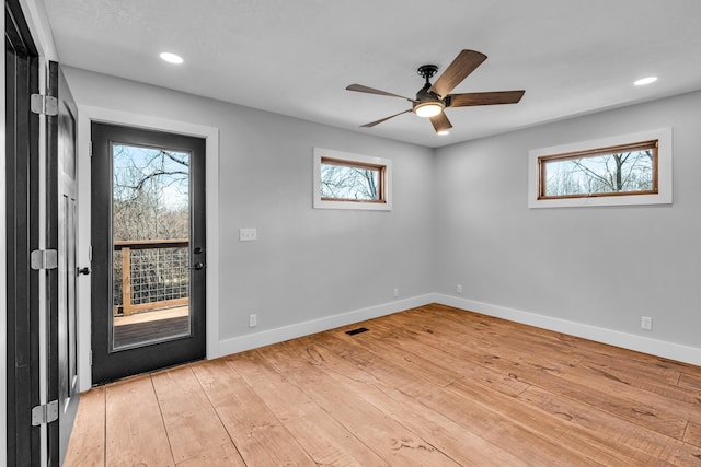 foyer featuring recessed lighting, visible vents, a ceiling fan, light wood-type flooring, and baseboards