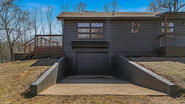 exterior space featuring a garage and driveway