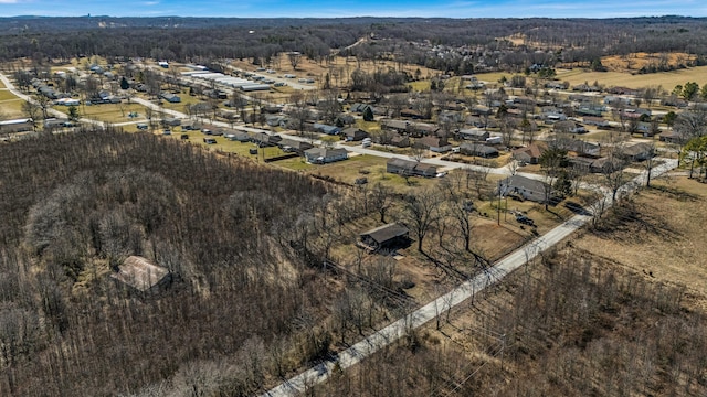 bird's eye view featuring a view of trees