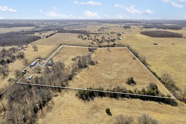 birds eye view of property featuring a rural view