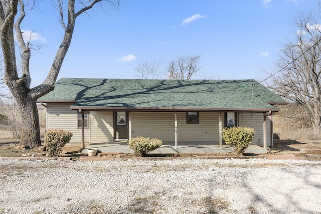 view of front of property with a shingled roof