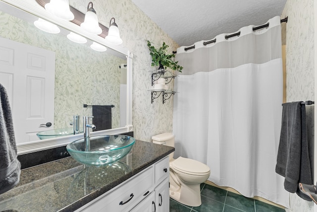 185 Eagle Pointe Dr, Branson, MO 65616 - bathroom with wallpapered walls, vanity, tile patterned floors, curtained shower, and a textured ceiling