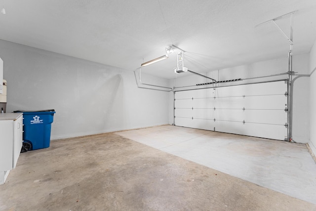 185 Eagle Pointe Dr, Branson, MO 65616 - garage featuring a garage door opener