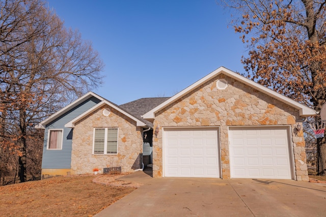 ranch-style house with concrete driveway, stone siding, roof with shingles, and an attached garage