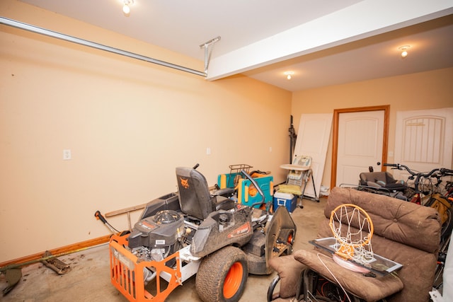 garage featuring baseboards