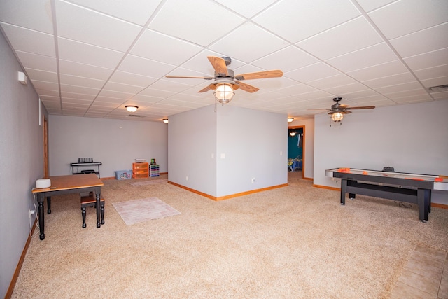 rec room featuring visible vents, baseboards, a ceiling fan, a drop ceiling, and carpet