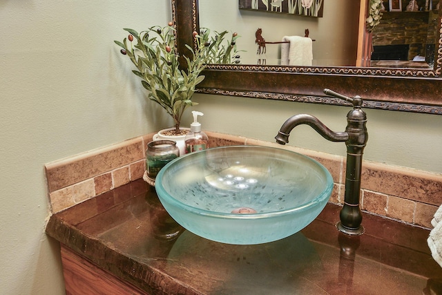 room details with a sink and decorative backsplash