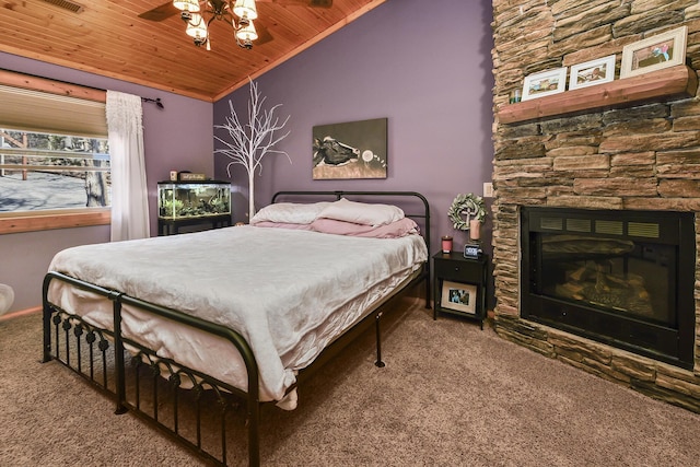 bedroom with a fireplace, wood ceiling, carpet flooring, vaulted ceiling, and baseboards