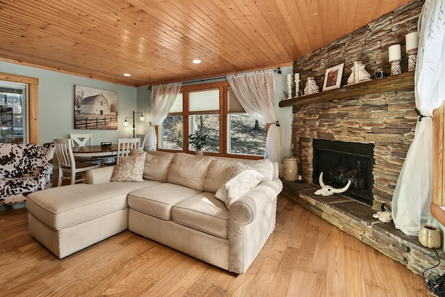 living room with a fireplace, wood finished floors, wood ceiling, and recessed lighting