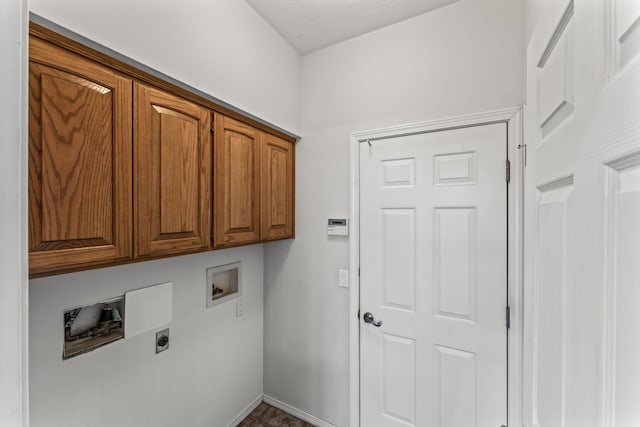 laundry area with washer hookup, cabinet space, hookup for an electric dryer, and baseboards