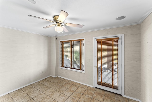 spare room with light tile patterned floors, ceiling fan, and crown molding