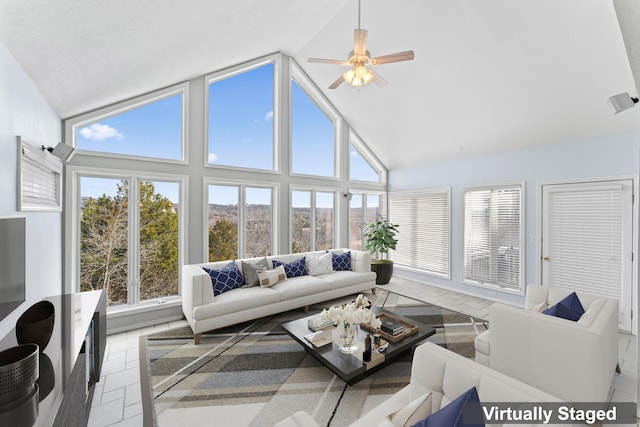 1701 Cedar Ridge Way, Branson West, MO 65737 - living room with plenty of natural light, tile patterned floors, ceiling fan, and high vaulted ceiling
