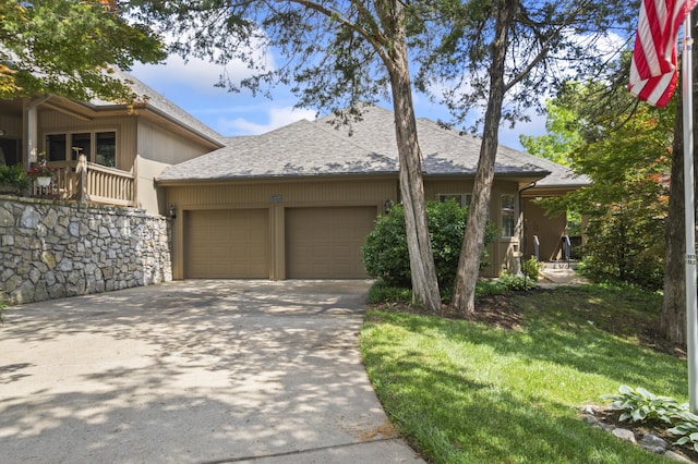 1701 Cedar Ridge Way, Branson West, MO 65737 - view of front of house with an attached garage, roof with shingles, and driveway