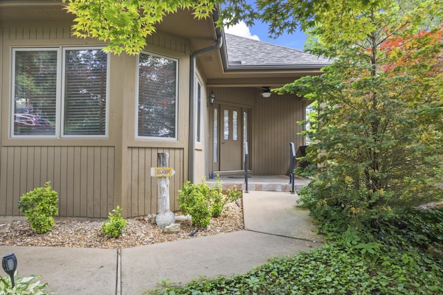 1701 Cedar Ridge Way, Branson West, MO 65737 - view of side of home featuring roof with shingles and a ceiling fan