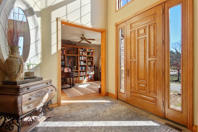 entryway with visible vents and baseboards