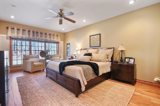 bedroom with light wood-style flooring, baseboards, ceiling fan, and recessed lighting