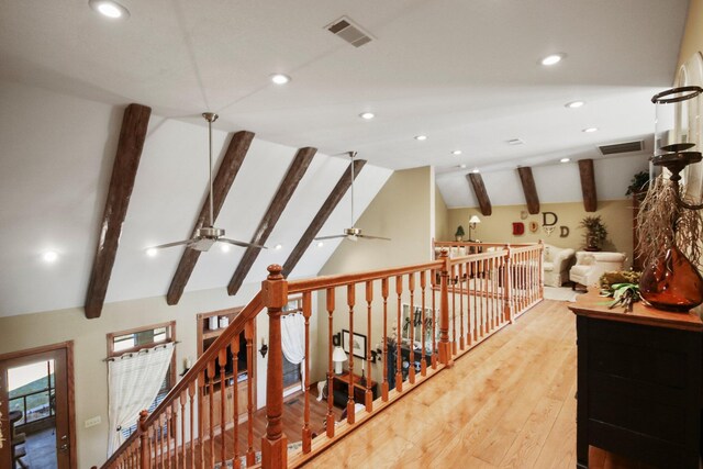 hall with vaulted ceiling with beams, light wood finished floors, visible vents, and recessed lighting