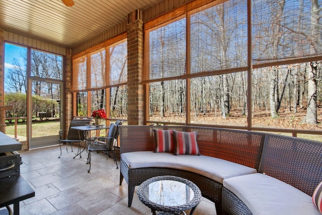 sunroom with wooden ceiling