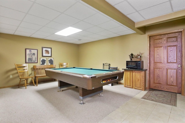 game room with light carpet, billiards, a drop ceiling, and light tile patterned flooring