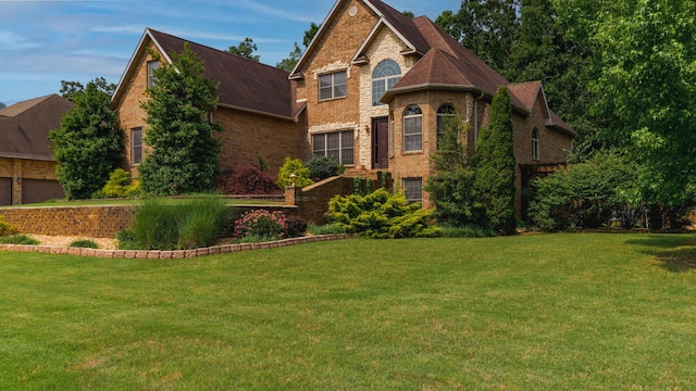 1165 Susan Dr, West Plains, MO 65775 - view of front of property with brick siding and a front lawn