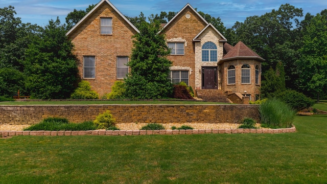 1165 Susan Dr, West Plains, MO 65775 - view of front of house featuring a front yard and brick siding