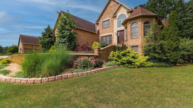 1165 Susan Dr, West Plains, MO 65775 - traditional home featuring brick siding and a front lawn