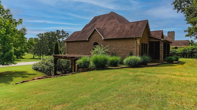 1165 Susan Dr, West Plains, MO 65775 - view of property exterior with a lawn, brick siding, a chimney, and a shingled roof