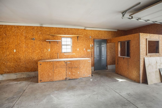 interior space with a garage and concrete floors