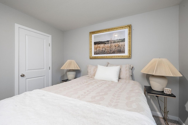 bedroom with baseboards