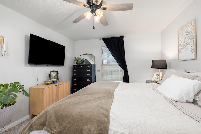 bedroom featuring carpet flooring, ceiling fan, and baseboards