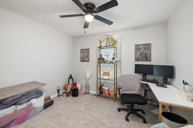 office with ceiling fan, carpet floors, and baseboards