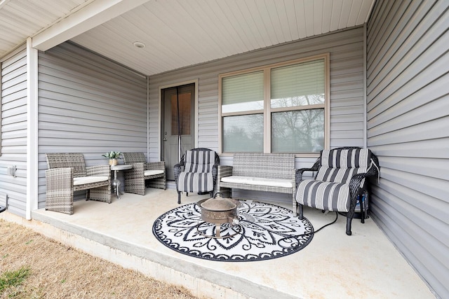 view of patio / terrace featuring a porch and an outdoor living space