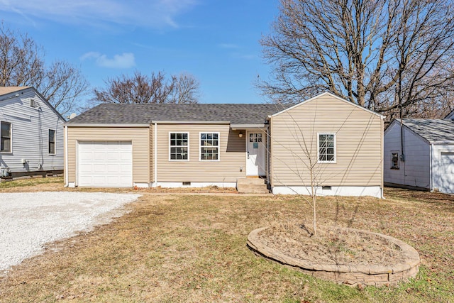 ranch-style home with a garage, a shingled roof, driveway, crawl space, and a front yard