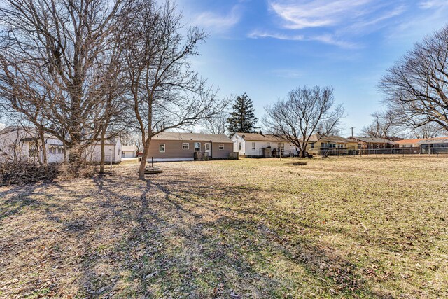 view of yard with fence