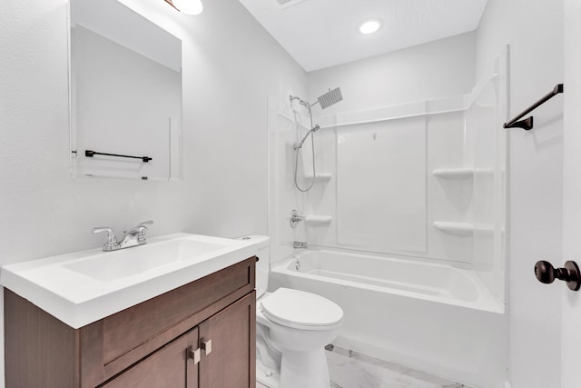 full bath with toilet, marble finish floor, shower / washtub combination, and vanity