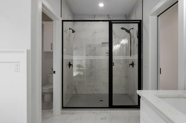 full bath with toilet, marble finish floor, and a marble finish shower