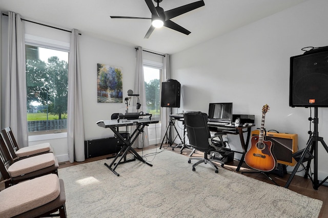 office featuring wood finished floors and a ceiling fan