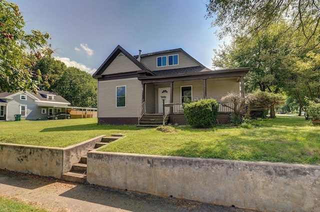 view of front of home featuring a porch and a front lawn